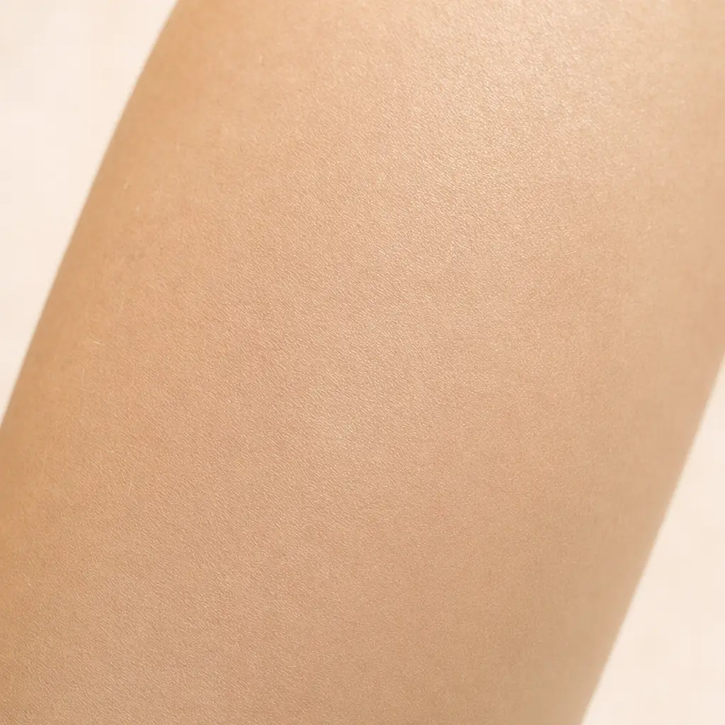 The same forearm skin, calmer and more even, after four weeks